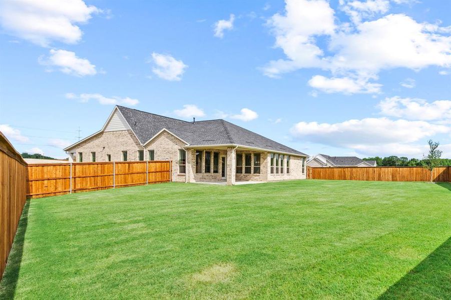 Exterior details and patio area of a home in Chatham Reserve, Krugerville (Image 2).