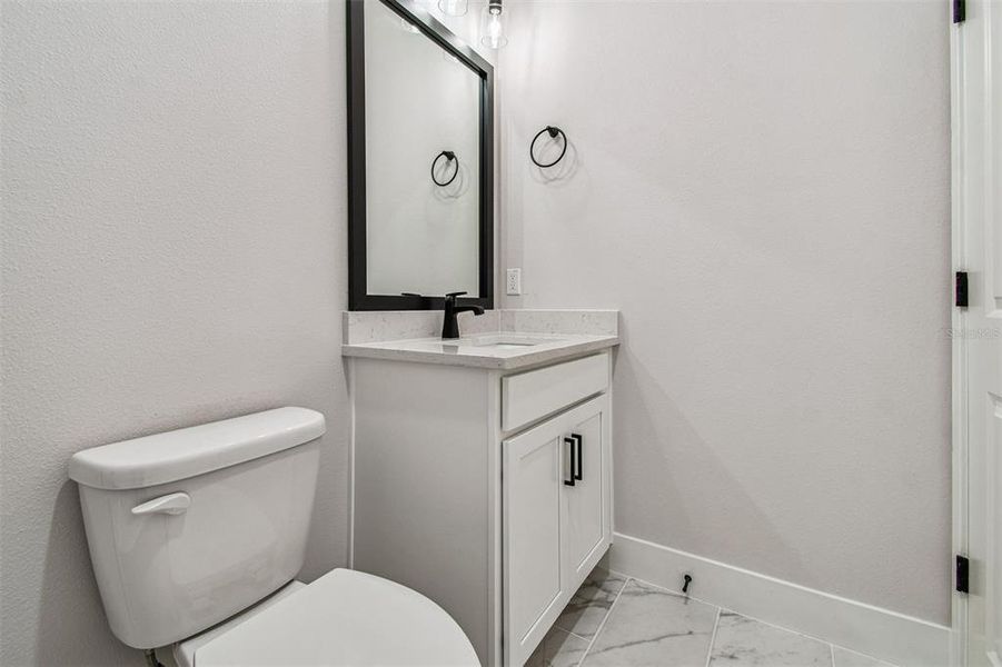 Furnished interior view inside a new home in North River Ranch – Garden Series, Parrish (Image 19).