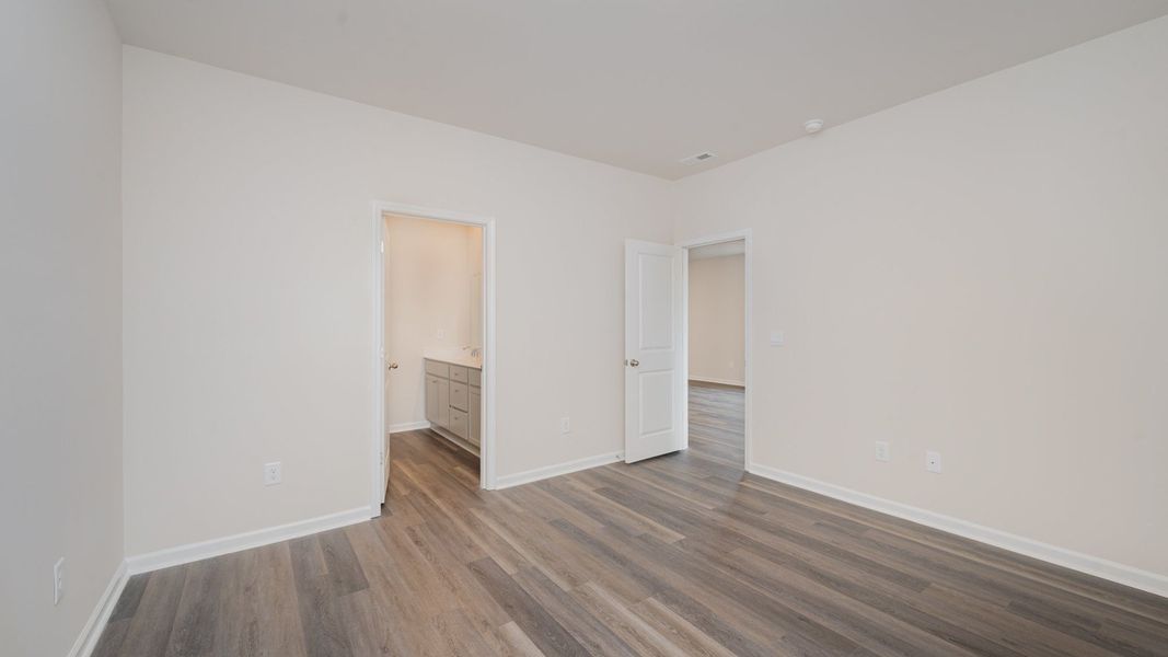Spacious, unfurnished interior of a new home in Indigo Preserve, Leland (Image 16).