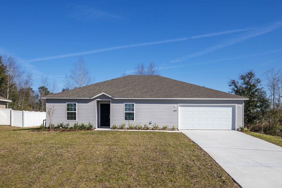 Front exterior of a home in the North Port community, located in North Port, FL (Image 4).