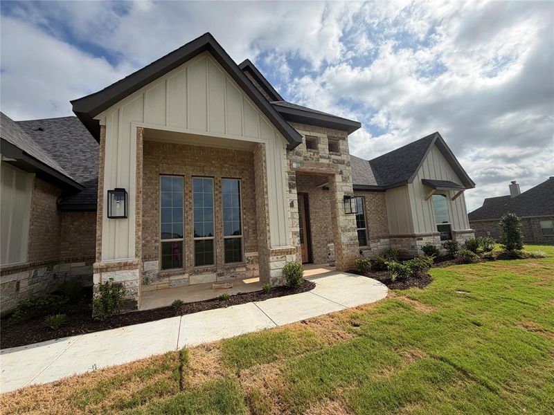 Front exterior of a new home in , Decatur, TX, highlighting curb appeal (Image 18).