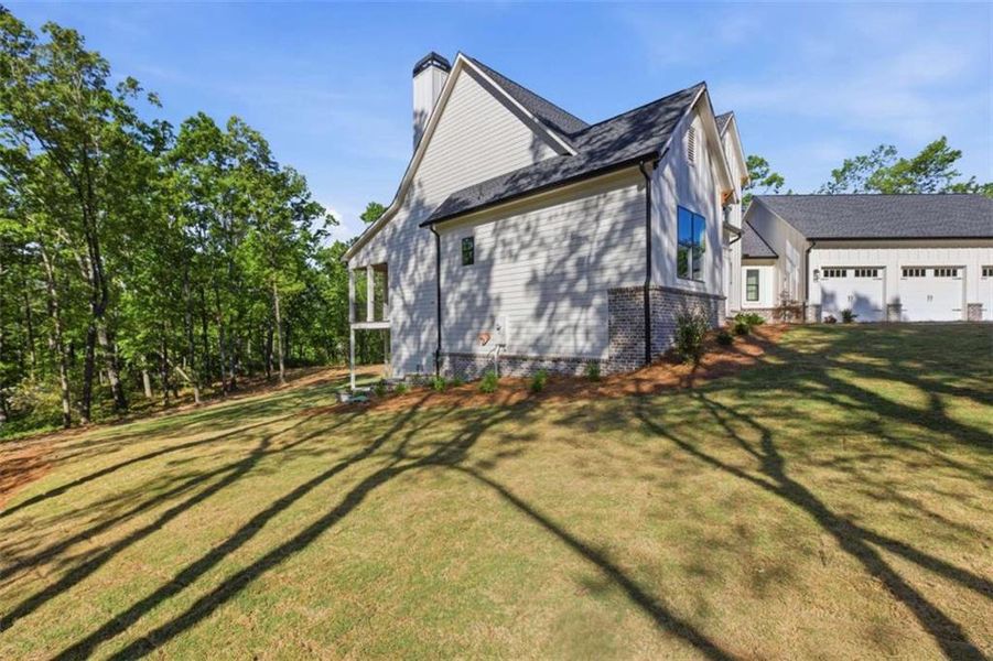 Exterior details and patio area of a home in , Clarkesville (Image 4).