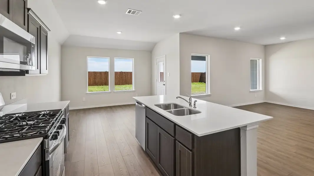 Furnished interior view inside a new home in Windrose, Pilot Point (Image 4).