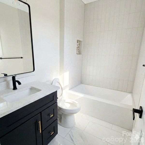 Furnished interior view inside a new home in , Concord (Image 8).