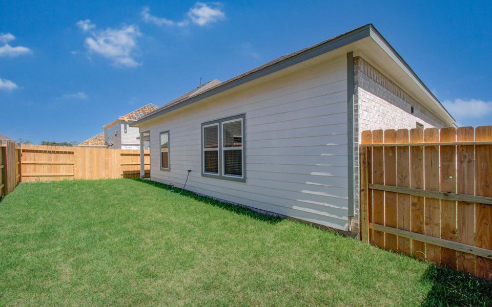 Exterior details and patio area of a home in Harmony Cove, Humble (Image 3). Exterior details and patio area of a home in Harmony Cove, Humble (Image 3).