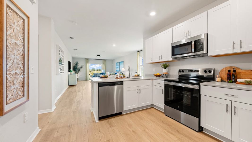Furnished interior view inside a new home in Waterstone, Groveland (Image 6).