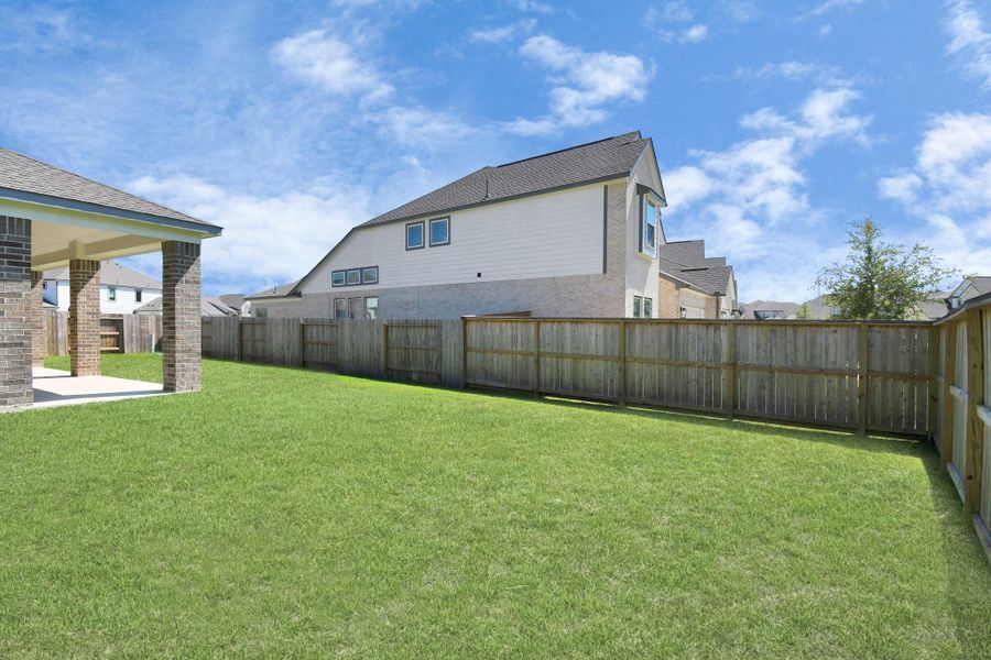 Experience outdoor living at its finest on this expansive covered patio, thoughtfully designed for BBQs and delightful outdoor dining. Experience outdoor living at its finest on this expansive covered patio, thoughtfully designed for BBQs and delightful outdoor dining.