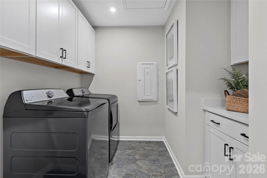 Laundry room outfitted with cabinet storage and washer dryer included! Laundry room outfitted with cabinet storage and washer dryer included!