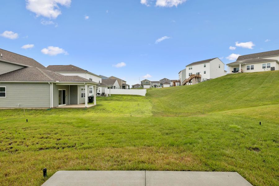 Exterior details and patio area of a home in Highlands of Carter's Station, Columbia (Image 25).