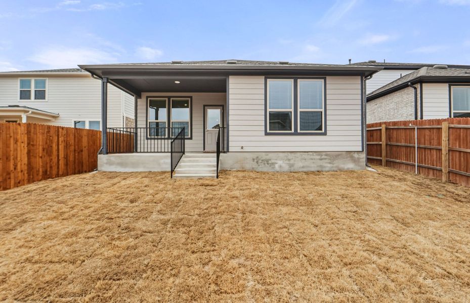 Exterior details and patio area of a home in Saddleback at Santa Rita Ranch, Liberty Hill (Image 25).