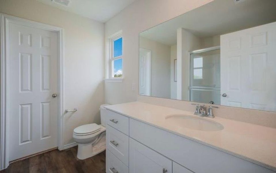 Furnished interior view inside a new home in The Pines At Seven Coves, Conroe (Image 14). Furnished interior view inside a new home in The Pines At Seven Coves, Conroe (Image 14).