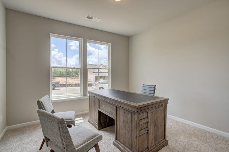 Furnished interior view inside a new home in Sutton's Landing, Statham (Image 7).