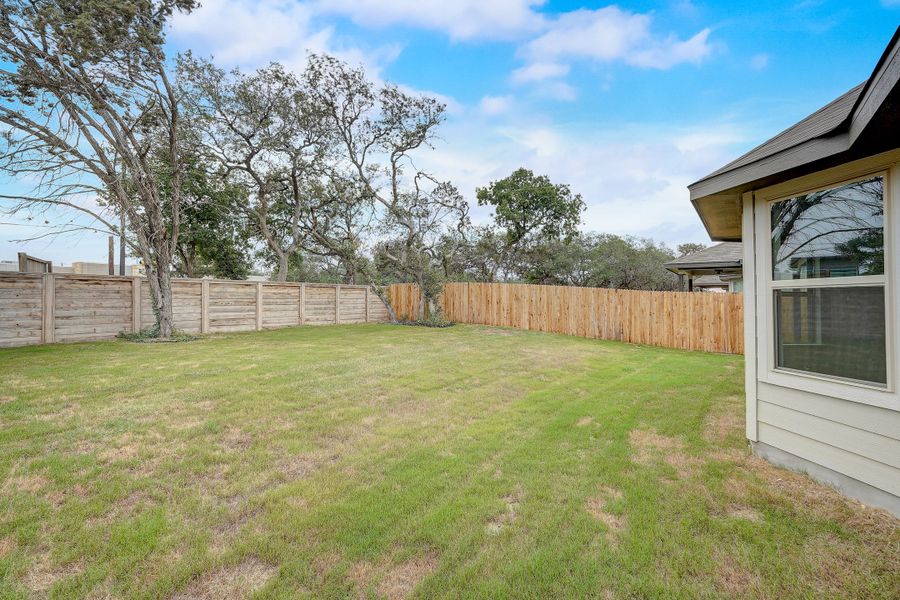 Backyard in the Oleander floorplan at a Meritage Homes community.