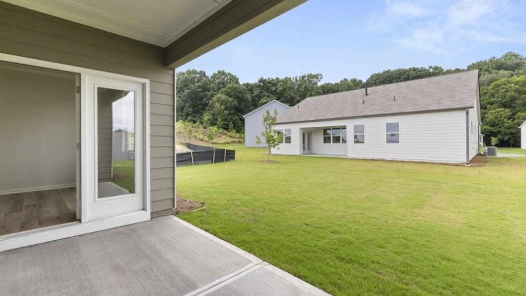 Exterior details and patio area of a home in Liberty Crossing, Braselton (Image 4).