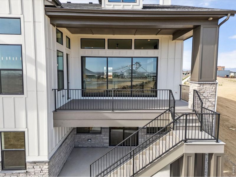 Exterior details and patio area of a home in RainDance, Windsor (Image 24).