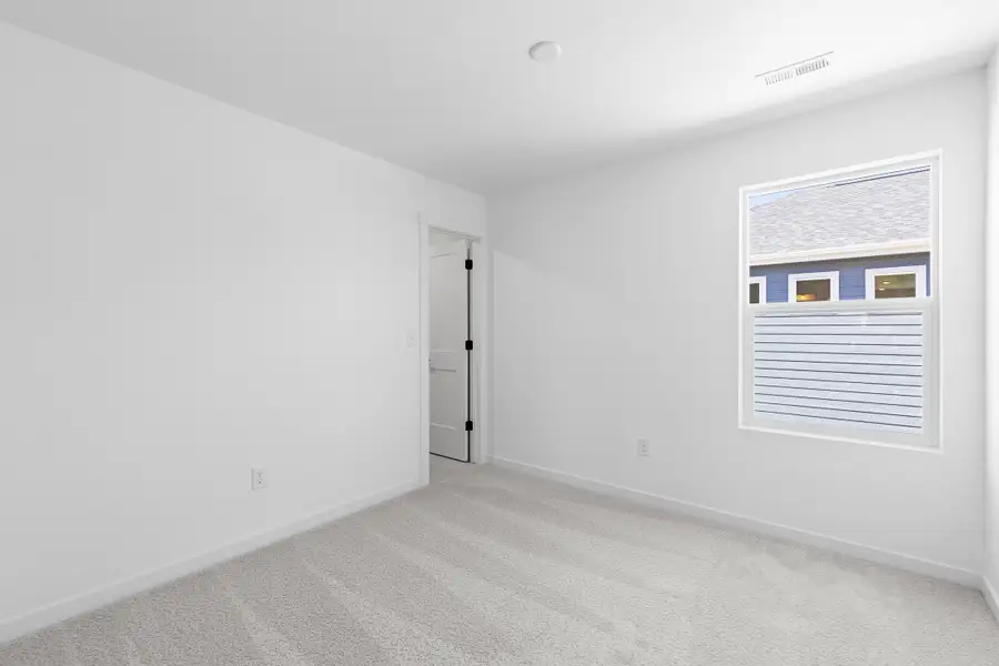 Representative unfurnished interior of a home built from the Bloom Series - Violet by Brightland Homes in Granary, Johnstown (Image 22). Representative unfurnished interior of a home built from the Bloom Series - Violet by Brightland Homes in Granary, Johnstown (Image 22).