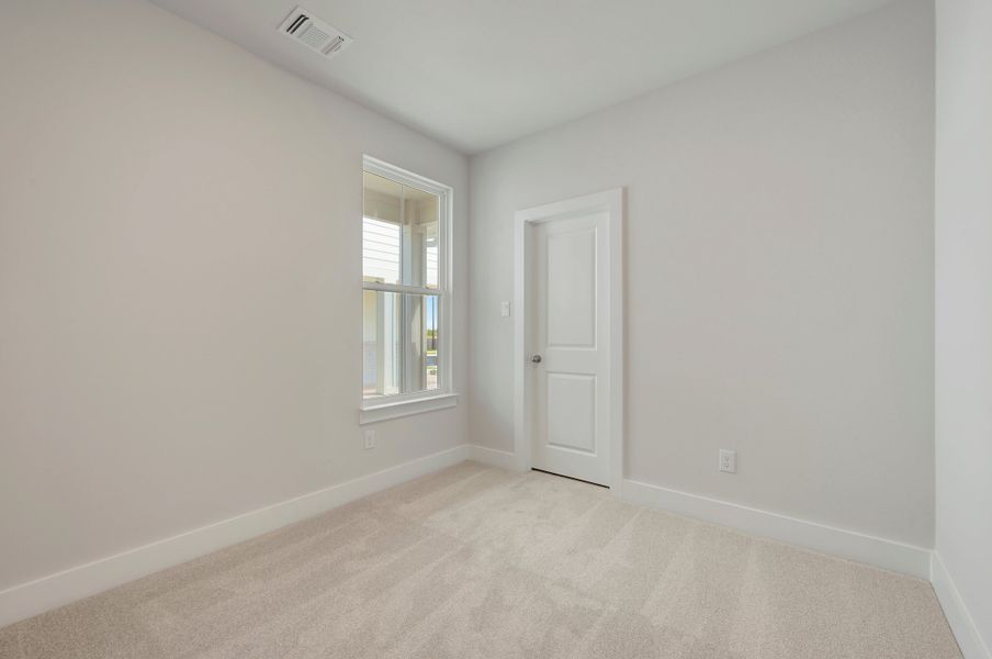 Spacious, unfurnished interior of a new home in The Meadows, Denton (Image 22).