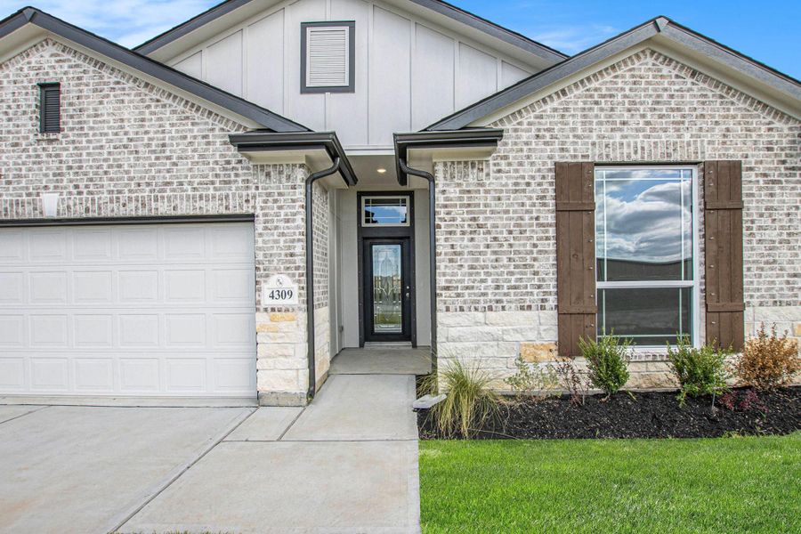 Exterior details and patio area of a home in , Bay City (Image 3).
