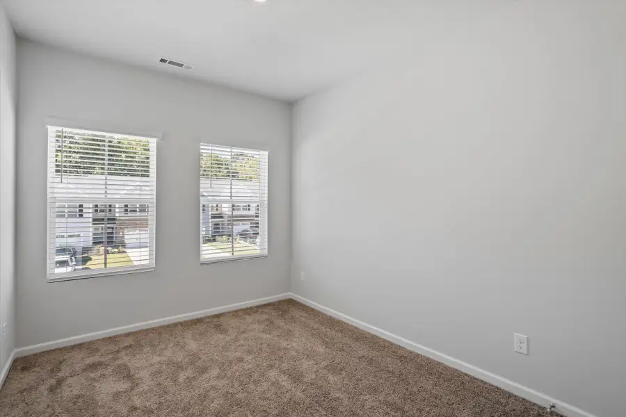 Spacious, unfurnished interior of a new home in West Main Townhomes, Sanford (Image 18).
