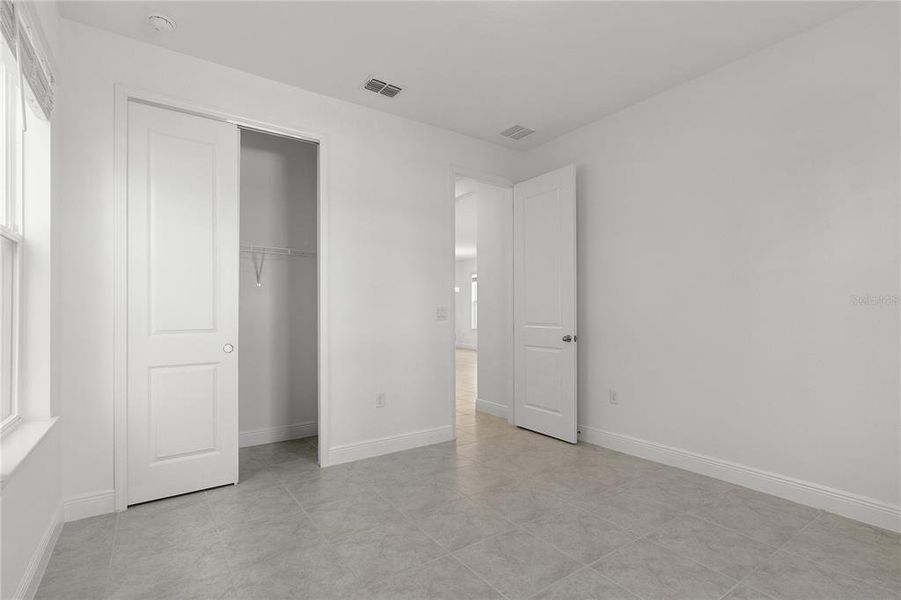 Spacious, unfurnished interior of a new home in Summerdale Park at Lake Nona, Orlando (Image 23).