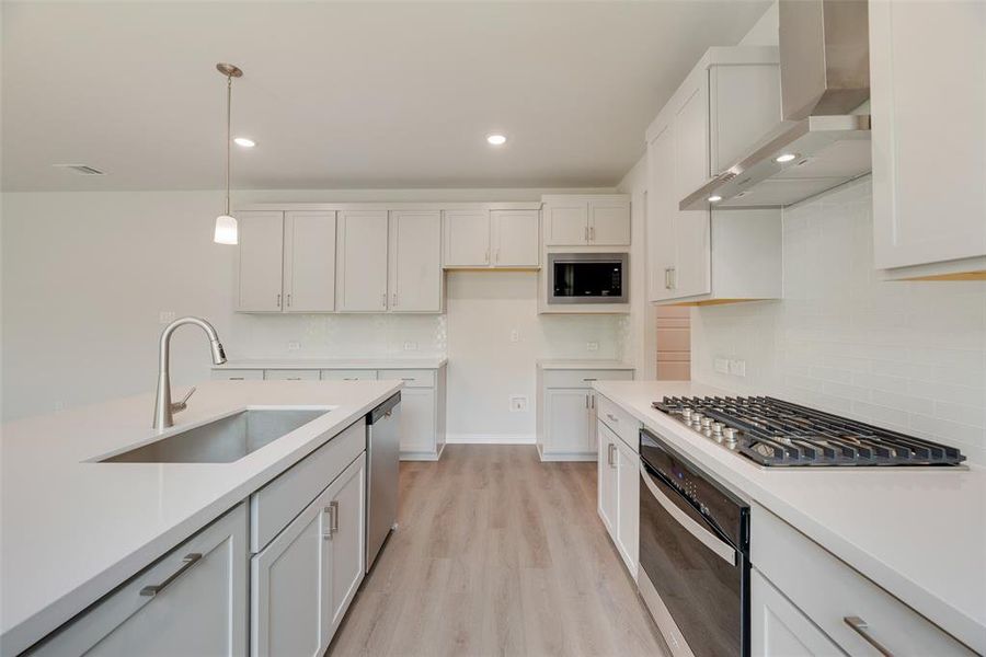 Furnished interior view inside a new home in Valencia On The Lake, Little Elm (Image 8). Furnished interior view inside a new home in Valencia On The Lake, Little Elm (Image 8).