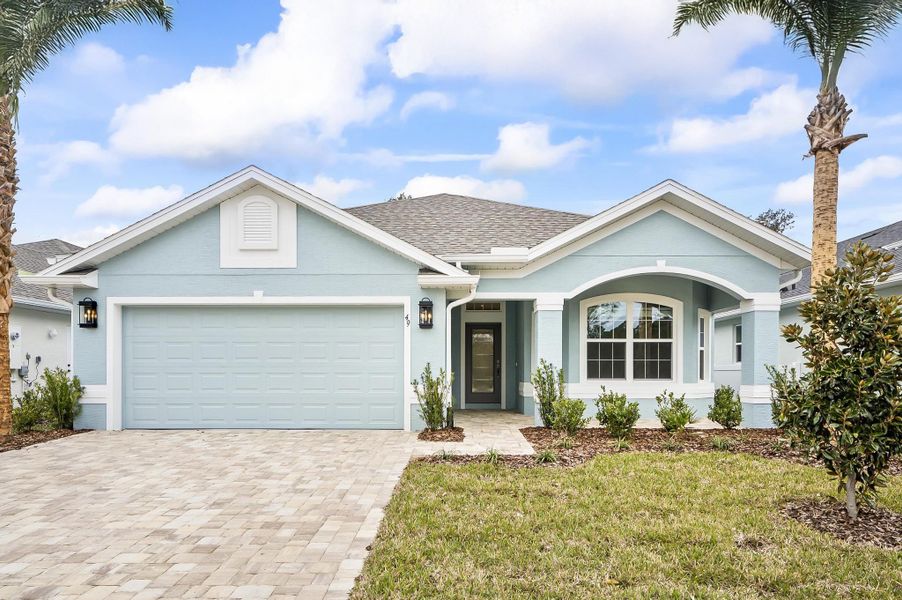 Front exterior of a new home in Matanzas Cove, Palm Coast, FL, highlighting curb appeal (Image 2). Front exterior of a new home in Matanzas Cove, Palm Coast, FL, highlighting curb appeal (Image 2).