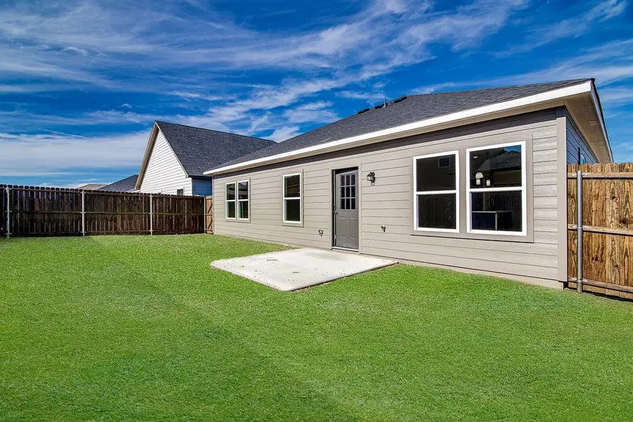 Exterior details and patio area of a home in Trails of Fossil Creek, Fort Worth (Image 2).