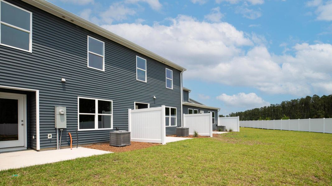 Front exterior of a new home in Townes at Seabrooke, Leland, NC, highlighting curb appeal (Image 2).