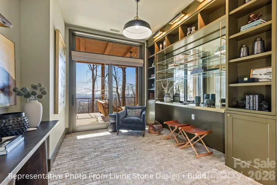 Library. Representative photo from Living Stone Design + Build showing the craftsmanship, quality of construction and finish level. Final design, finishes, and details may vary. Library. Representative photo from Living Stone Design + Build showing the craftsmanship, quality of construction and finish level. Final design, finishes, and details may vary.