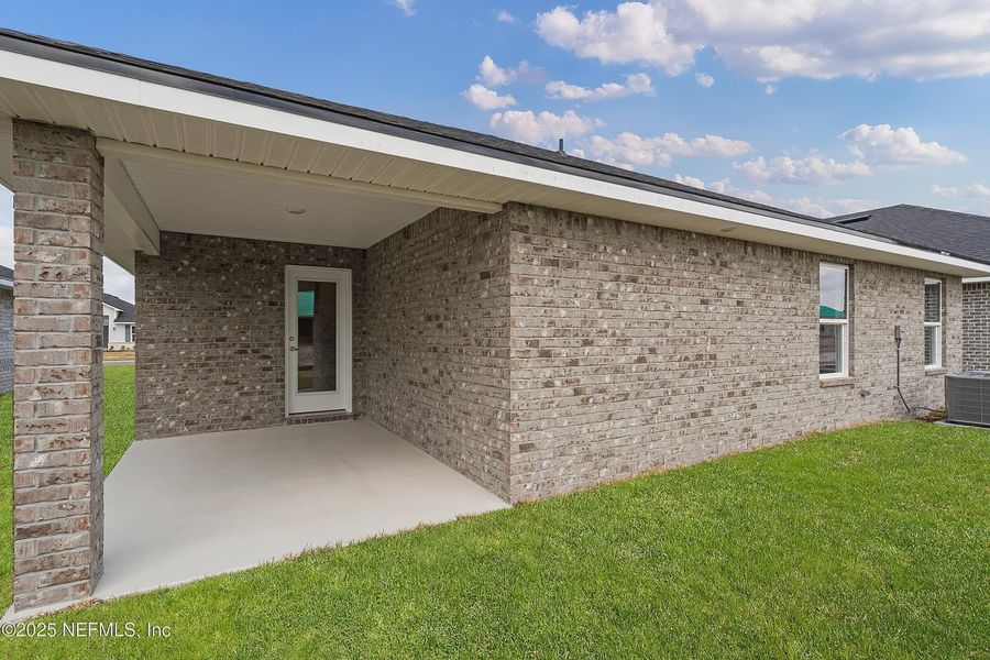 Front exterior of a new home in Shadow Crest at Rolling Hills, Green Cove Springs, FL, highlighting curb appeal (Image 15). Front exterior of a new home in Shadow Crest at Rolling Hills, Green Cove Springs, FL, highlighting curb appeal (Image 15).
