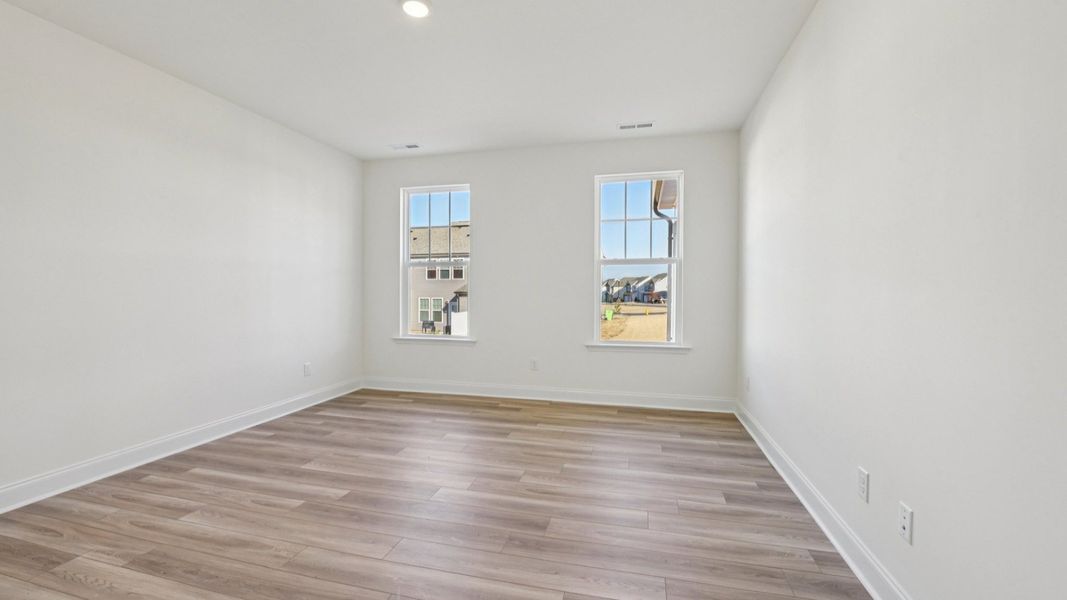 Representative furnished interior of a home built from the Chelsea by DRB Homes in Jasper Landing, Four Oaks (Image 11).