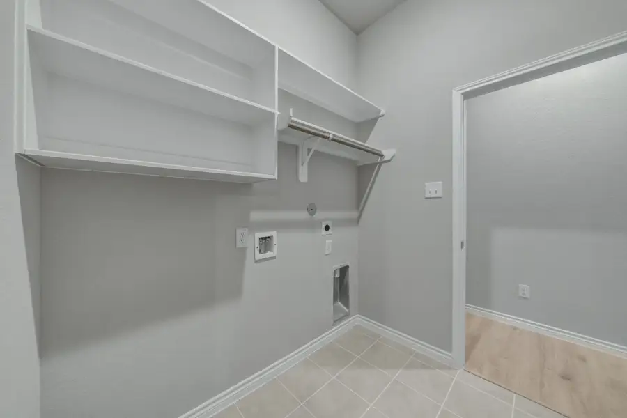 Utility Room in the Cedar home plan by Trophy Signature Homes – REPRESENTATIVE PHOTO Utility Room in the Cedar home plan by Trophy Signature Homes – REPRESENTATIVE PHOTO