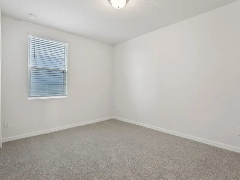 Spacious, unfurnished interior of a new home in The Meadow at Crossprairie, St. Cloud (Image 12).