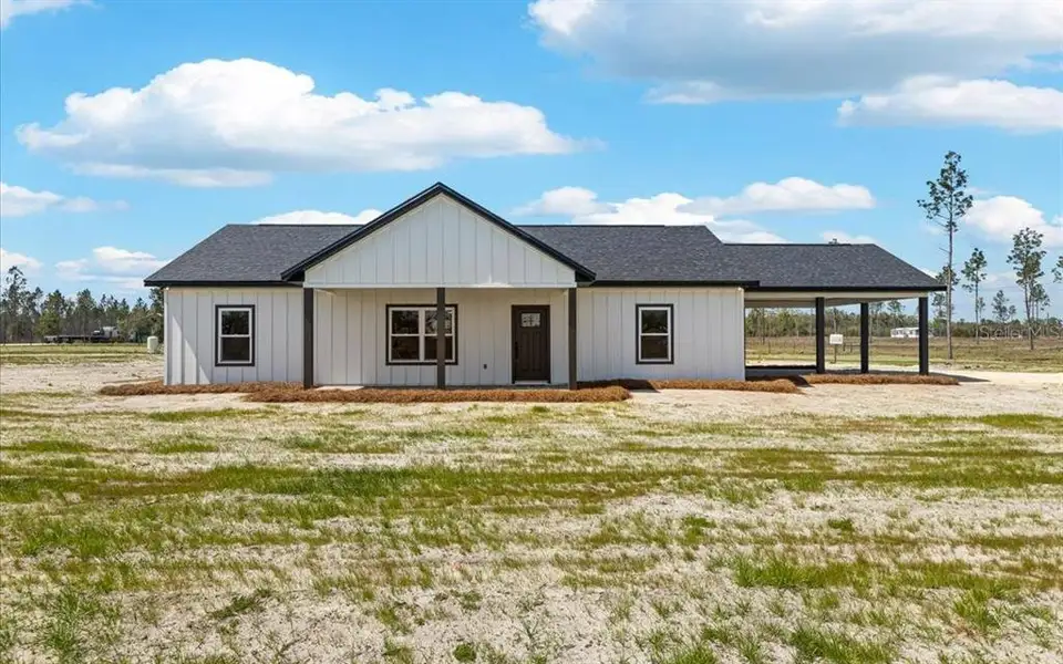 Exterior details and patio area of a home in , Live Oak (Image 2). Exterior details and patio area of a home in , Live Oak (Image 2).