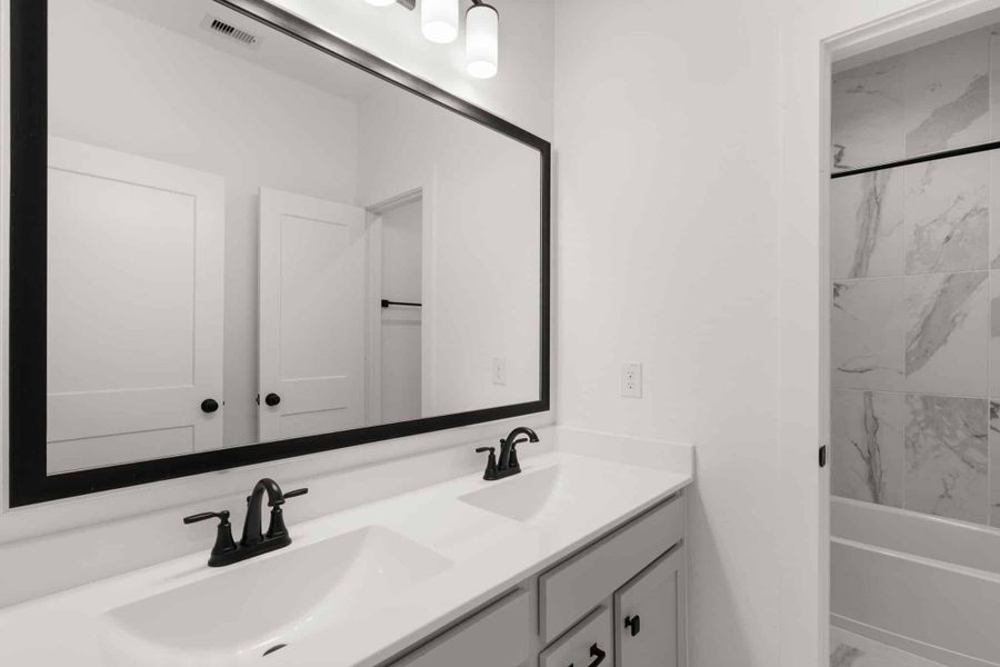 Furnished interior view inside a new home in Wood Leaf Reserve, Tomball (Image 17).