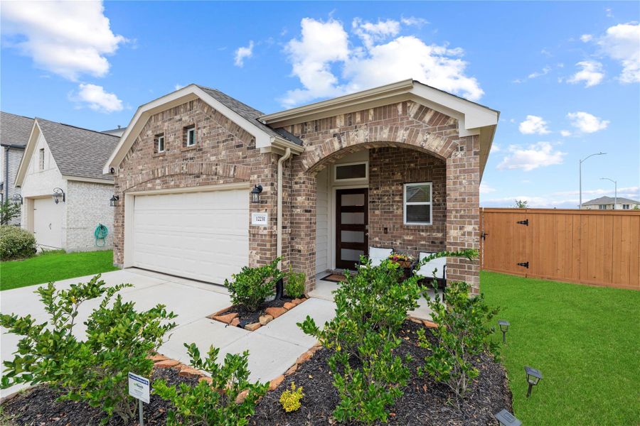 Front exterior of a new home in Balmoral East, Houston, TX, highlighting curb appeal (Image 1). Front exterior of a new home in Balmoral East, Houston, TX, highlighting curb appeal (Image 1).