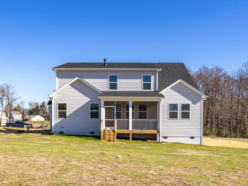 Exterior details and patio area of a home in Tobacco Road, Angier (Image 2).