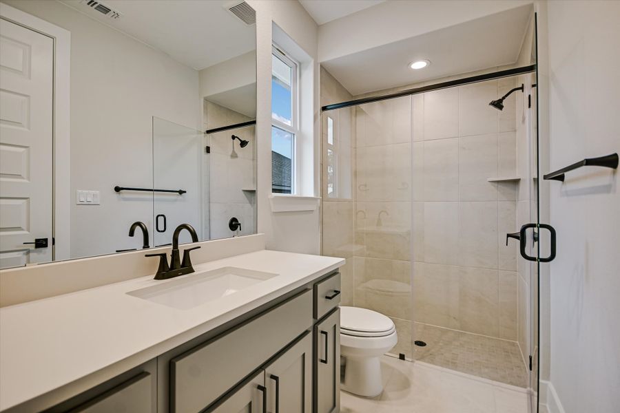 Representative furnished interior of a home built from the Sapphire by Giddens Homes in Riverstone, Georgetown (Image 61).