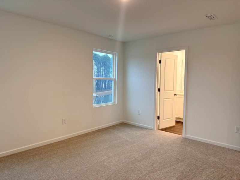 Primary Bed - A sophisticated retreat with style. Primary Bed - A sophisticated retreat with style.