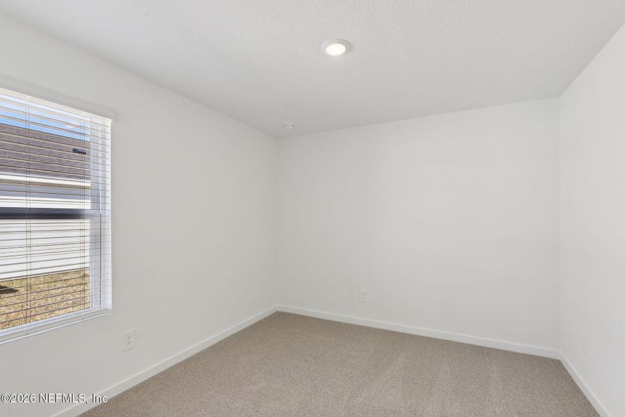 Spacious, unfurnished interior of a new home in Colbert Landings, Palm Coast (Image 24).