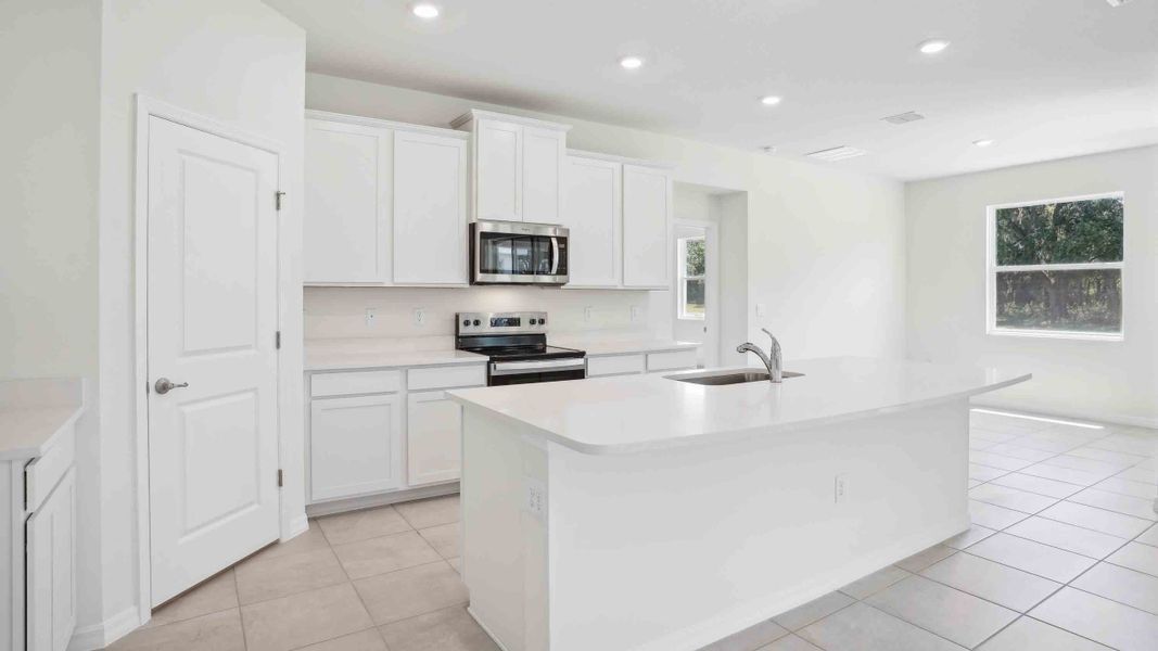 Representative furnished interior of a home built from the Camden by D.R. Horton in Ocala Preserve, Ocala (Image 7).