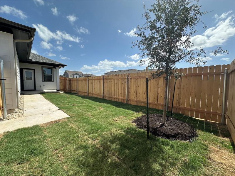 Exterior details and patio area of a home in Porter Country, Buda (Image 16).