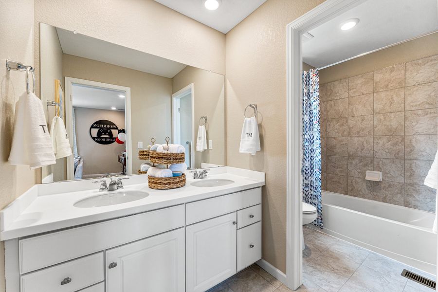 Furnished interior view inside a new home in The Aurora Highlands, Aurora (Image 24).
