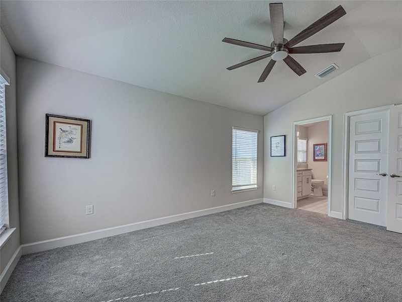 Spacious, unfurnished interior of a new home in Watercress Cove, North Port (Image 40).