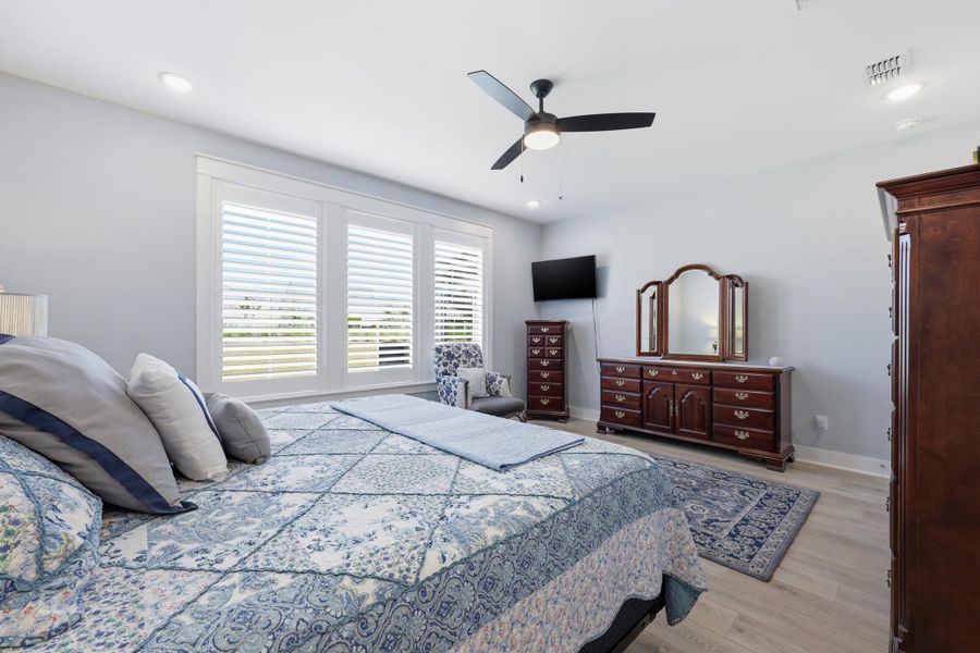 Furnished interior view inside a new home in K. Hovnanian's® Four Seasons at Lakes of Cane Bay, Summerville (Image 18).