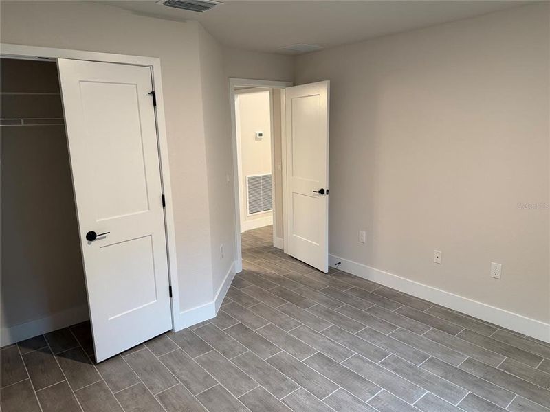 Spacious, unfurnished interior of a new home in Port Charlotte, Port Charlotte (Image 15).