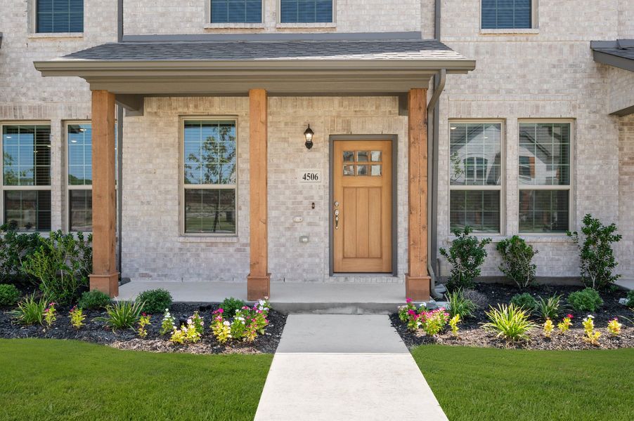 Front exterior of a new home in Sanger Circle – Townhomes, Sanger, TX, highlighting curb appeal (Image 29). Front exterior of a new home in Sanger Circle – Townhomes, Sanger, TX, highlighting curb appeal (Image 29).