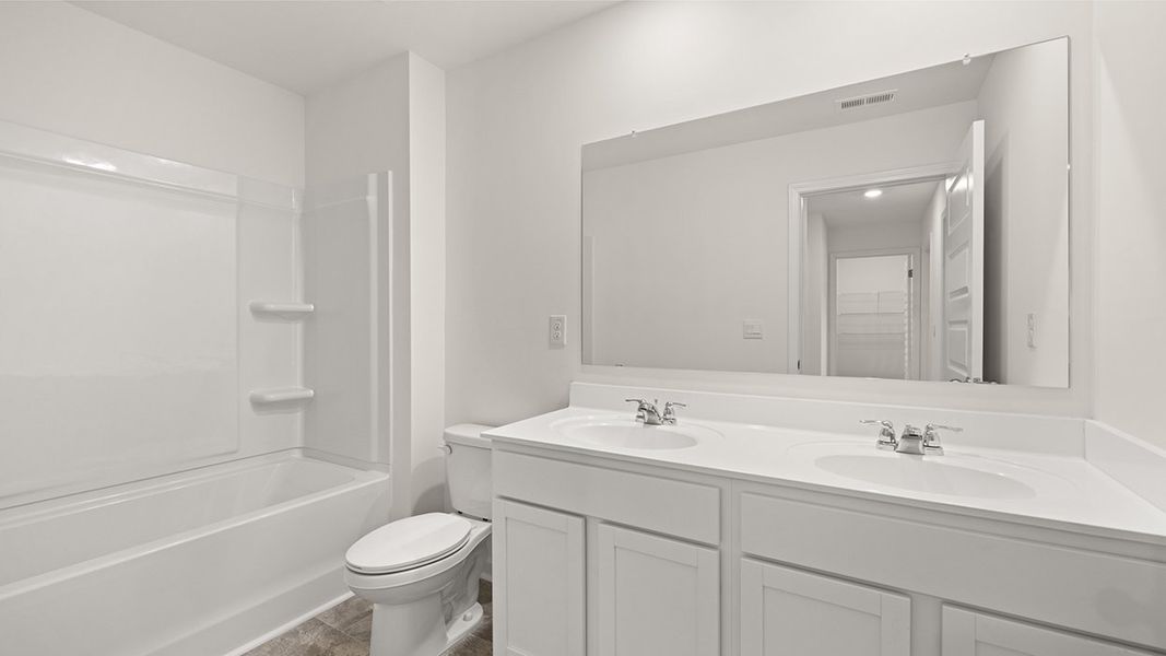 Furnished interior view inside a new home in Independence Villas and Townhomes, Loganville (Image 10).