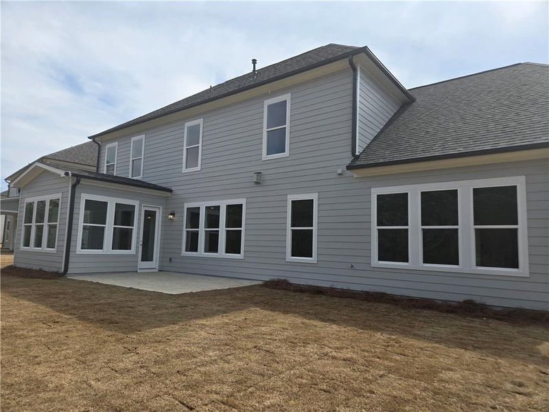 Exterior details and patio area of a home in Ashbury Commons, Powder Springs (Image 3).