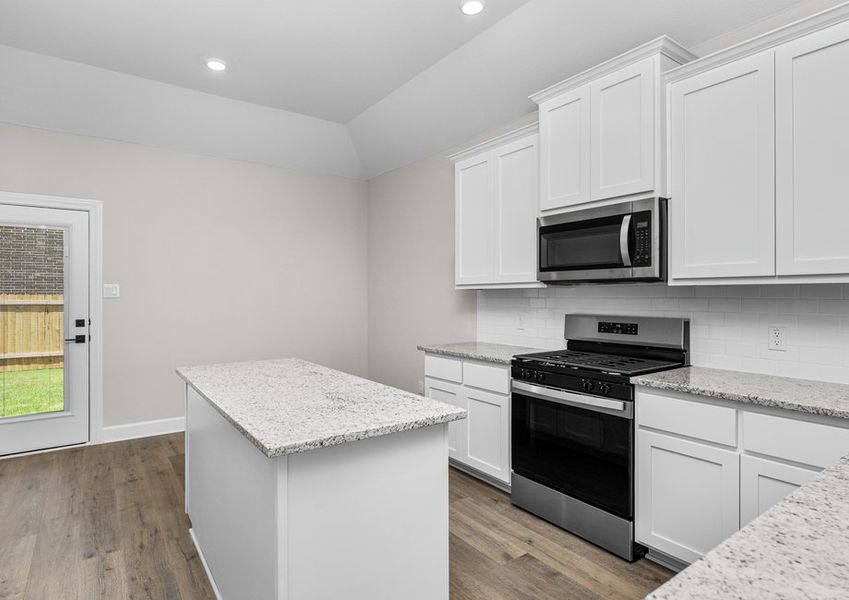 The kitchen has sprawling granite countertops. The kitchen has sprawling granite countertops.